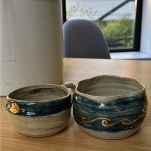 Handcrafted Ceramic Mug and Wavy Bowl with Gold Accents